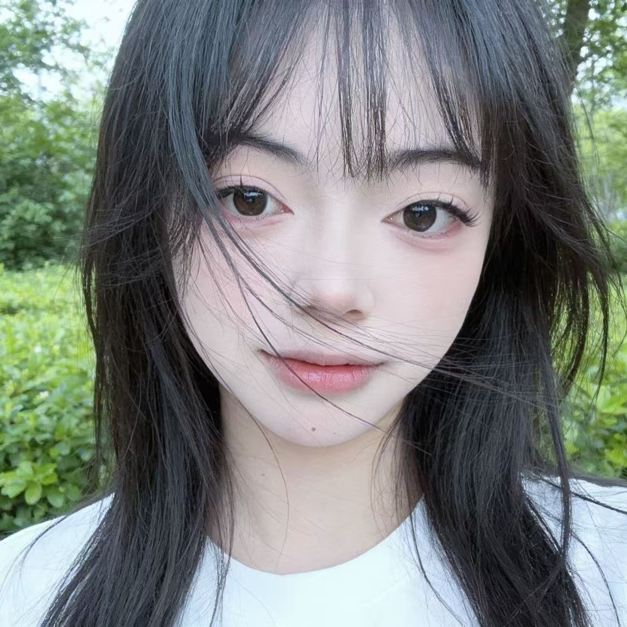 七七